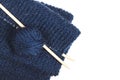 Process of knitting. Ball of blue woolen thread and knitting needle closeup on wooden table in rustic. Needlecraft Royalty Free Stock Photo