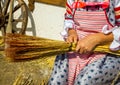 The process of knitting a traditional broom for the home