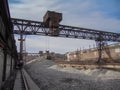 The process of loading crushed stone with a gantry crane Royalty Free Stock Photo