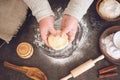 Process of making christmas cookies. Mature woman, granny hands making dough