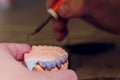 The process of making a dental prosthesis in a dental laboratory. Royalty Free Stock Photo