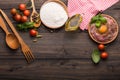 The process of making Food background for tasty Italian dishes with tomato. Various cooking ingredients with spaghetti and spoon.