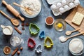 The process of making gingerbread Christmas tree cookies. Bake sweet cake dessert concept. Top view, flat lay style Royalty Free Stock Photo