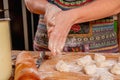 Process of making homemade dumplings. Beautiful young woman making Ukrainian dumplings with potatoes and cheese stuffing. National