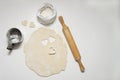 Making homemade sugar cookies in the shape of a heart. A gift for Valentine's Day