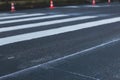 Process of making new road surface markings with a line striping machine, workers improve city infrastructure, demarcation marking Royalty Free Stock Photo