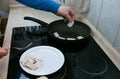 The process of making an omelet with lard and sausage. Royalty Free Stock Photo