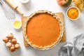 The process of making pumpkin pie for Thanksgiving Day. View from above. Royalty Free Stock Photo