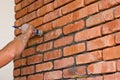 Process of making a red brick wall, home renovation Royalty Free Stock Photo