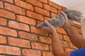 Process of making a red brick wall, home renovation Royalty Free Stock Photo