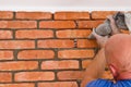 Process of making a red brick wall, home renovation Royalty Free Stock Photo