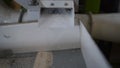 The process of milling unhusked rice into rice at a rice mill