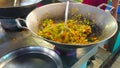 Cooking of vegetable omelette, Tanin market stall, Chiang Mai, Thailand