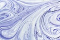 The process of mixing white and blue paint close-up. Abstract background for layouts. Royalty Free Stock Photo