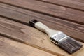 The process of painting wood surfaces with a brush Royalty Free Stock Photo