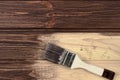 The process of painting wood surfaces with a brush. Unfinished p Royalty Free Stock Photo