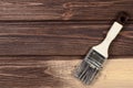 The process of painting wood surfaces with a brush. Unfinished p Royalty Free Stock Photo