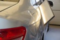 Process Of Paintless Dent Repair On Car Body. Big Dent On Rear Car Fender. PDR Removal Course Training.