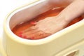 Process paraffin treatment of female hands Royalty Free Stock Photo