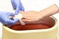 Process paraffin treatment of female hands Royalty Free Stock Photo