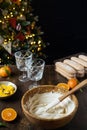 Process of preparation christmas layered dessert, no bake cheesecake or trifle with tangerines and chocolate