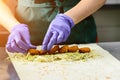 Process of preparing appetizing roll with falafel, sauce and pic