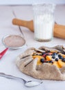 Process of preparing biscuits with peach and blueberry