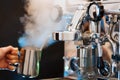 Barista making coffee at small cafe. Royalty Free Stock Photo