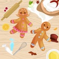 Process of preparing Christmas treats and sweets on a wooden kitchen table. Gingerbread man and ingredients for cooking