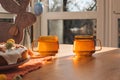 The process of preparing and decorating an Easter cupcake in the kitchen with white cream Royalty Free Stock Photo