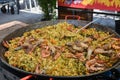 The process of preparing a quesadilla, traditional Mexican dish. Outdoor outside setting