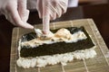 Process of preparing rolling sushi Royalty Free Stock Photo