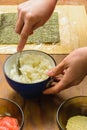 The process of preparing sushi from rice and additional ingredients at home Royalty Free Stock Photo