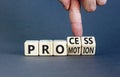 Process and promotion symbol. Concept words Process and promotion on wooden cubes. Businessman hand. Beautiful grey table grey