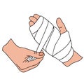 A process of providing first aid to a person in an accident. Bandaging an injured hand Royalty Free Stock Photo