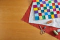 Process of quilt sandwich assembling, sewing accessories Royalty Free Stock Photo
