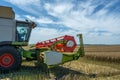 Process of harvesting by harvesters. plants in reapers. truck unloading