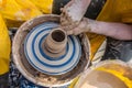 Process of rotation of potter`s wheel, hands of ceramist Royalty Free Stock Photo