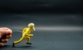 Process of running stopmotion. First step of running. Man\'s hand holding with aluminum wire a figure created with modeling Royalty Free Stock Photo