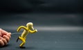 Process of running stopmotion. Second step of running. Man\'s hand holding with aluminum wire a figure created with modeling Royalty Free Stock Photo