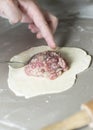 The process of sculpting meat dumplings. Royalty Free Stock Photo