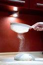 The process of sifting flour into dough Royalty Free Stock Photo