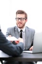 The process of signing documents. Businessman giving to his coll Royalty Free Stock Photo