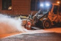 Process of snow removal on the city streets and roads with municipal vehicle, bulldozer, snowblower plow truck, snowplow, snow