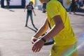 Process of throwing frisbee, kids teenagers tossing disc golf outdoors in a city park in a summer sunny day, frisbee playing with Royalty Free Stock Photo