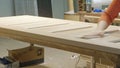 The process of veneering wood blanks, the production of wooden doors