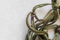 The process of weaving string bags from green threads. dense paracord with knots, close up, selective focus Royalty Free Stock Photo