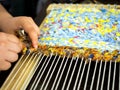 The process of weaving a traditional Russian patchwork rug