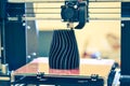 The process of working 3D printer and creating a three-dimensional object Royalty Free Stock Photo