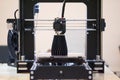 The process of working 3D printer and creating a three-dimensional object Royalty Free Stock Photo